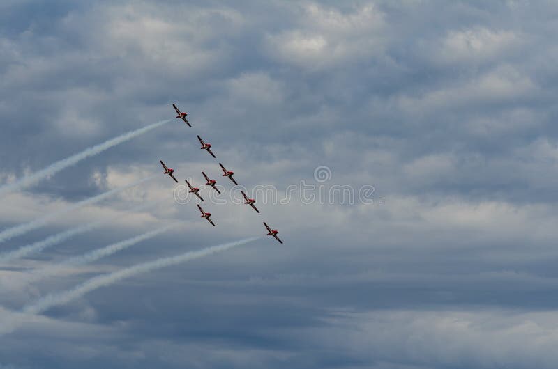 Snowbirds synchronized acrobatic planes performing at air show stock photos Snowbirds synchronized acrobatic planes performing at air show stock photos