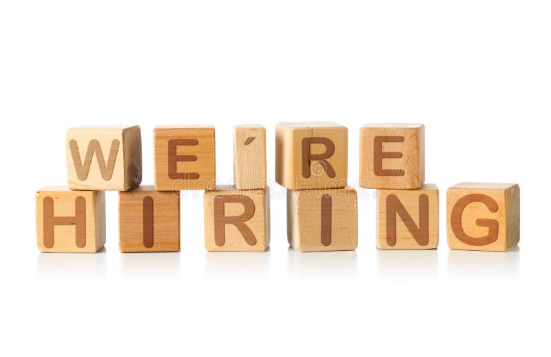 We`re Hiring written on wooden cube blocks on white - human resources or job vacancy concept