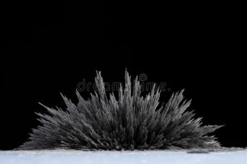 reaction-iron-dust-to-magnetic-field-strong-neodymium-magnet-black-background-282098544.jpg?w=360