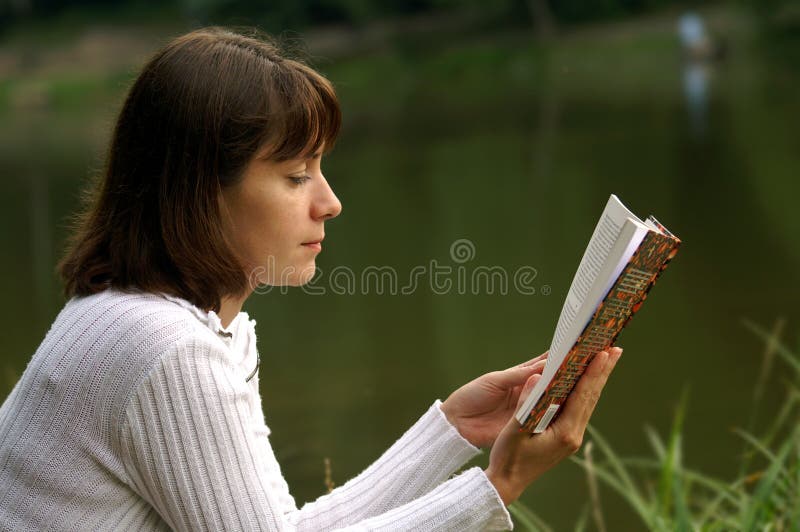 Reading a book royalty free stock photography