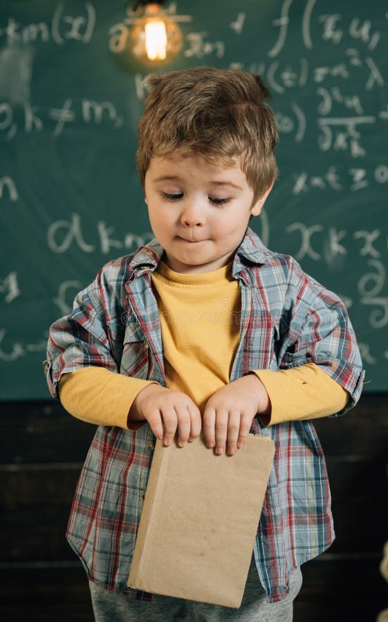 Reading a book. Little boy learn reading in school. English reading lesson. I love reading. Books are full of incredible royalty free stock images Reading a book. Little boy learn reading in school. English reading lesson. I love reading. Books are full of incredible royalty free stock images