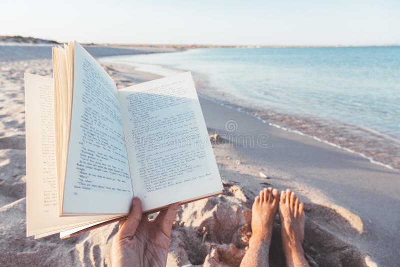 Reading book near the sea
