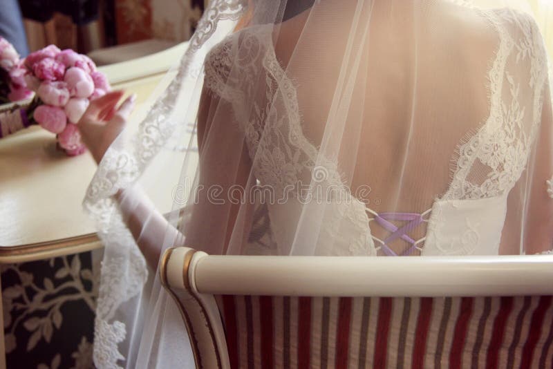 Lovely wedding details: bouquet and lace. Wedding ceremony. Lovely wedding details: bouquet and lace. Wedding ceremony.