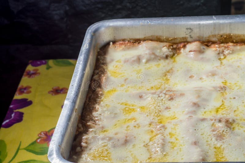 Readymade Lasagna with Melted Cheese and Copy Space on the Left Stock