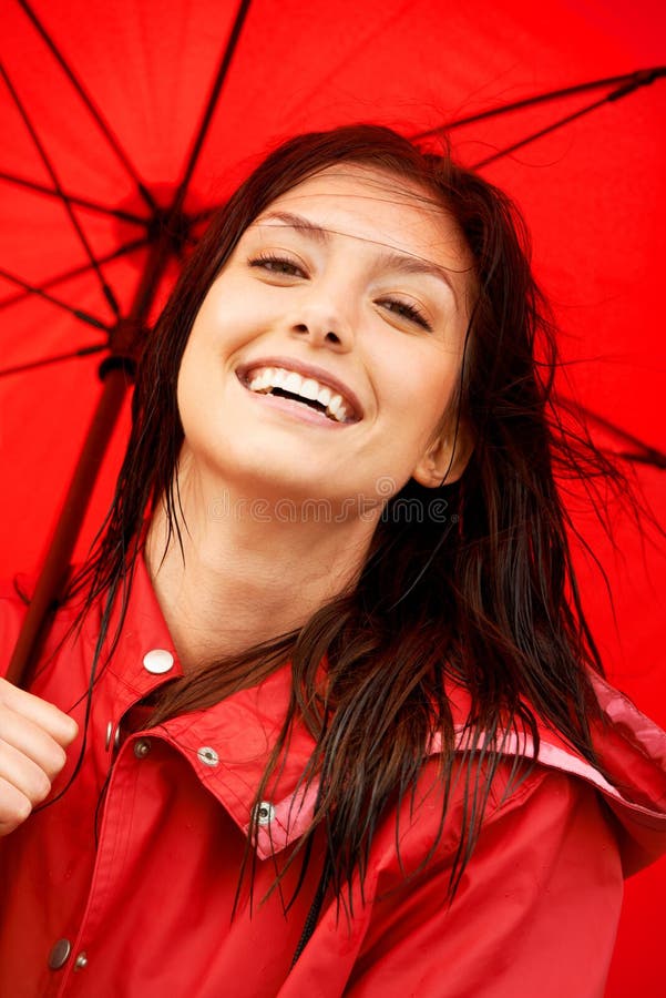 Ready for a Rainy Day. Closeup of a Beautiful Young Woman Laughing ...