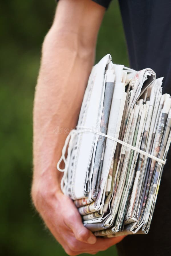 Ready for Recycling. a Man with a Stack of Newspaper. Stock Image