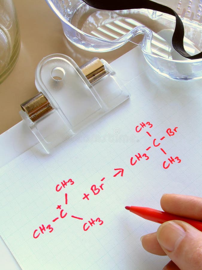 Close-up of a clipboard on which the equation for an organic chemical reaction has been written. Close-up of a clipboard on which the equation for an organic chemical reaction has been written.