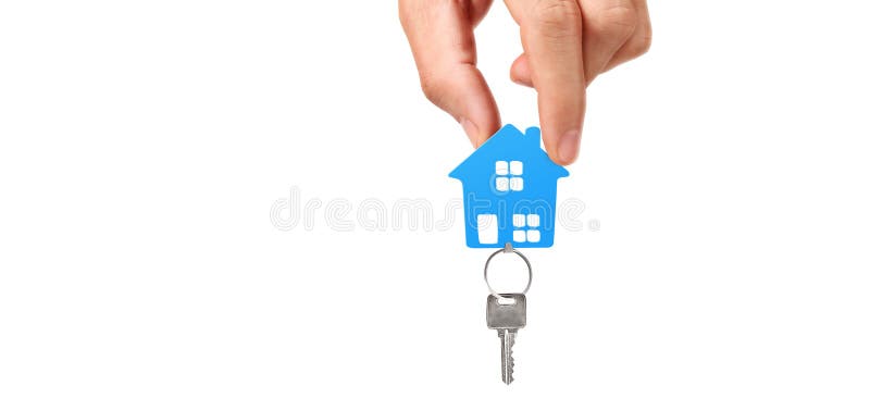 Real estate agent handing over house keys in hand