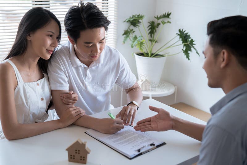 Real Estate Agent Proposes To Client To Sign Contract, Signing the