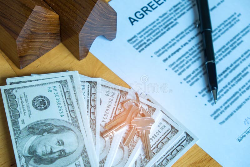 Real Estate Concepts,Document Agreement, Model House with Dollar Stock