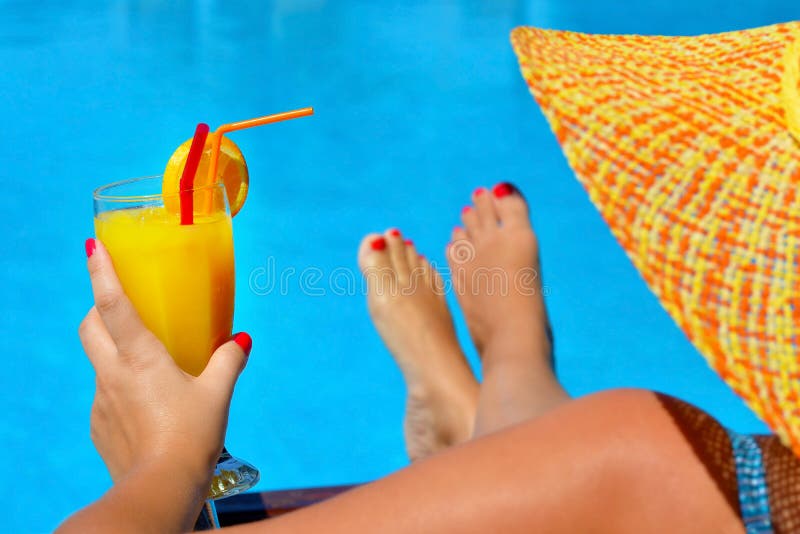 Real female beauty relaxing at swimming pool