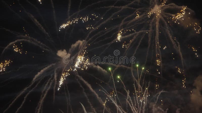 Real fireworks exploding in the sky during a celebration. Slow motion stock video