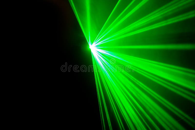 Real green laser lights on black background