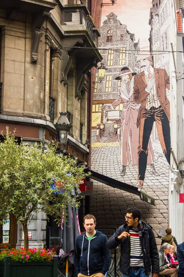 Real life and comics together in Brussels streets royalty free stock image Real life and comics together in Brussels streets royalty free stock image