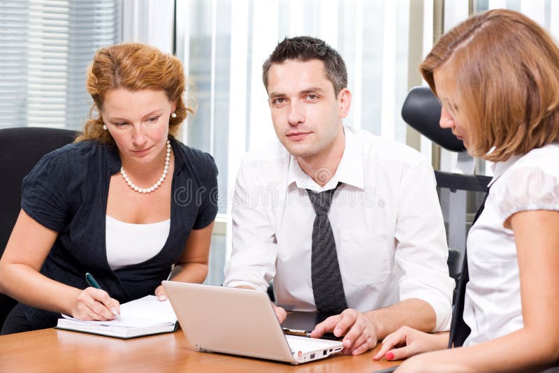 Real office worker posing for camera