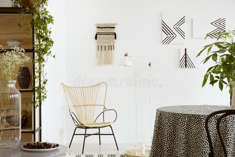 Real photo of a garden chair standing against white wall with ma stock image Real photo of a garden chair standing against white wall with ma stock image