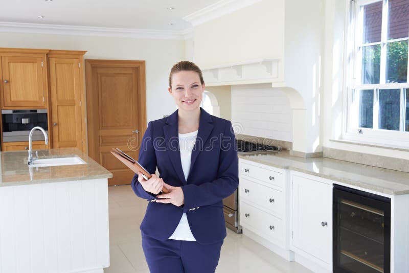 Realtor Looking Around Vacant New Property