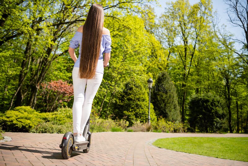 rear-back-behind-full-length-body-size-view-attractive-girl-riding-scooter-resting-spending-holiday-downtown-outdoors-rear-227729779.jpg