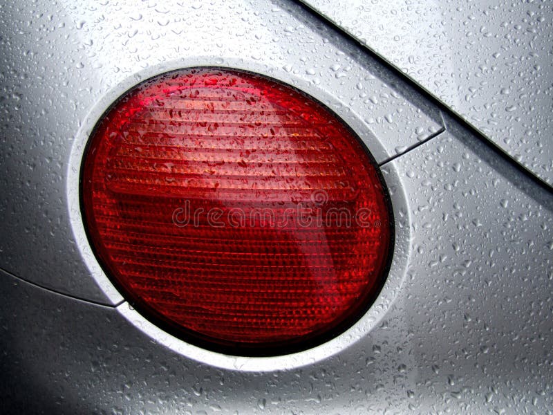 Rear car light and water dew drops