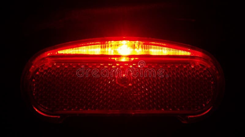 The rear red lantern of the bicycle lights stop light stock video footage