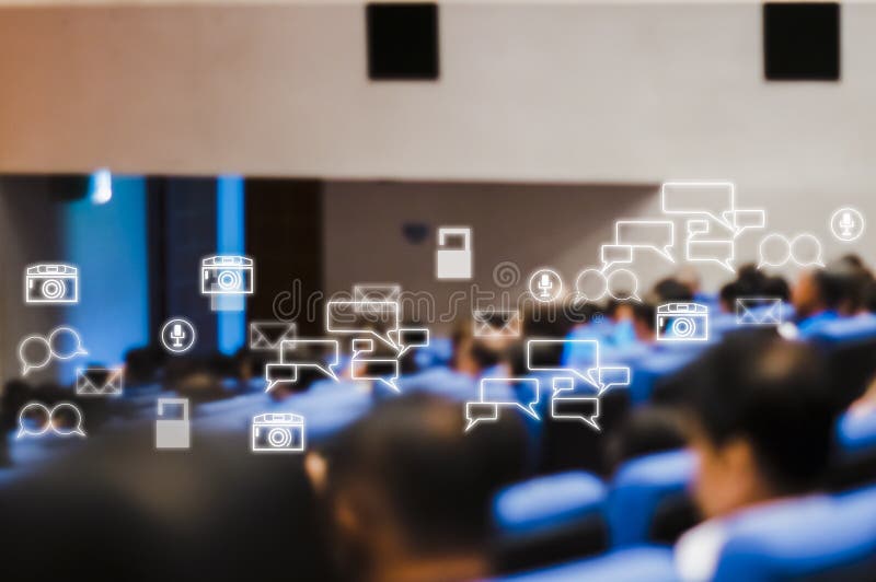 Rear view of audience attending meeting business seminar in conference room With Social Icons stock images Rear view of audience attending meeting business seminar in conference room With Social Icons stock images
