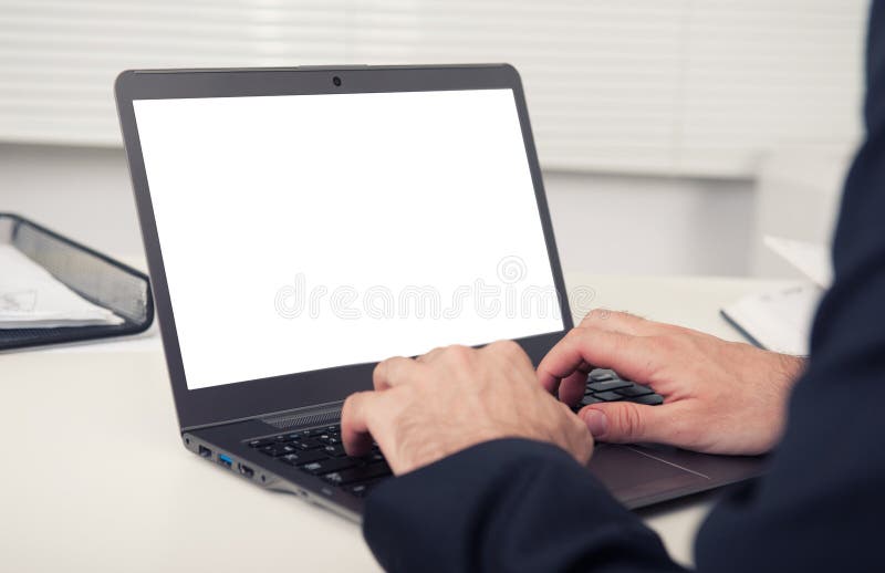 Rear view of business man hands using laptop