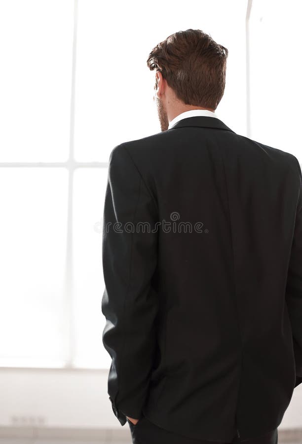 Rear View.business Man Looks Out the Office Window Stock Photo - Image ...