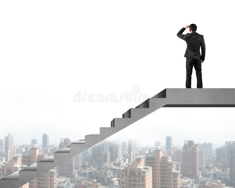 Rear view businessman gazing at city on concrete stairs top royalty free stock photo
