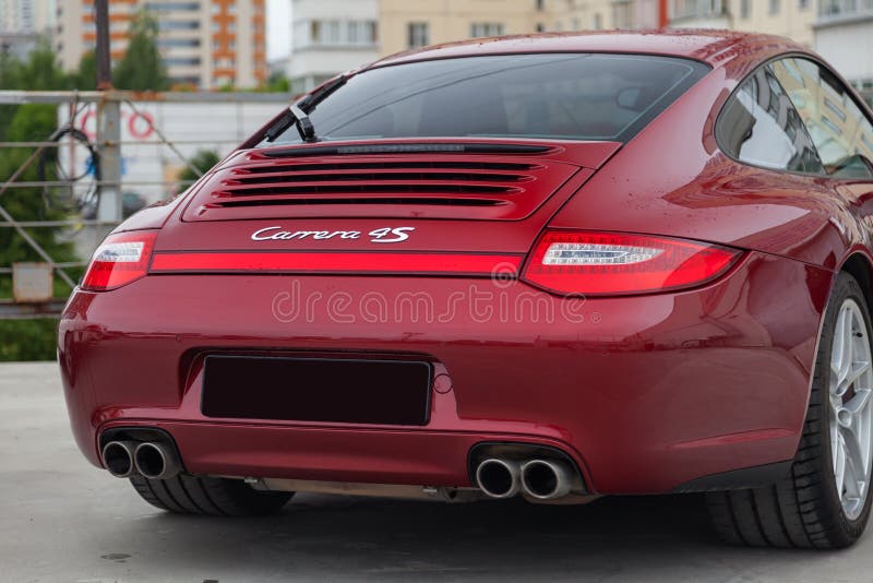 Rear View of Car Porsche 911 Carrera 4s with Dark Gray Interior in  Excellent Condition in a Parking Against City Landscape Editorial  Photography - Image of exhibition, parking: 153448677