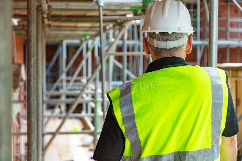 Rear View of a Construction Worker or Builder on Building Site Stock ...