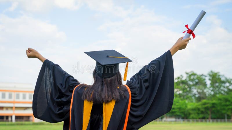 Rear View of a Female University Graduate Stands and Holds Degree Certificate To Celebrate in the Graduation Ceremony with Clear Stock Image 800x450 hq nude picture Rear View of a Female University Graduate Stands and Holds Degree Certificate To Celebrate in the Graduation Ceremony with Clear Stock Image