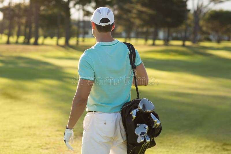 Rear View Man Carrying Golf Bag Stock Photos Free & RoyaltyFree