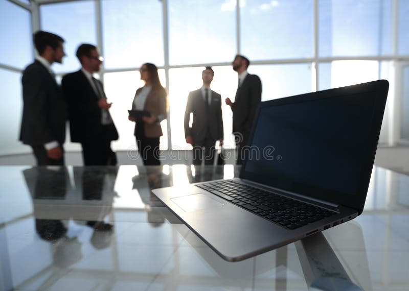 Rear view.a group of business people standing in the lobby of the business center royalty free stock photo Rear view.a group of business people standing in the lobby of the business center royalty free stock photo