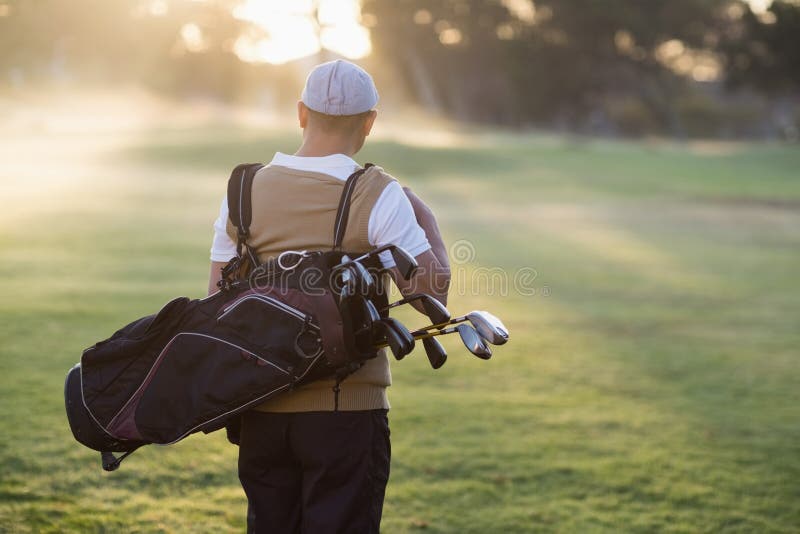 Rear View Man Carrying Golf Bag Stock Photos Free & RoyaltyFree