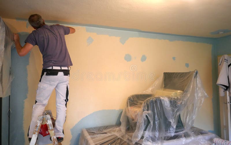 Man Ready To Paint One Wall Holding Painting Tools Stock Photo Image