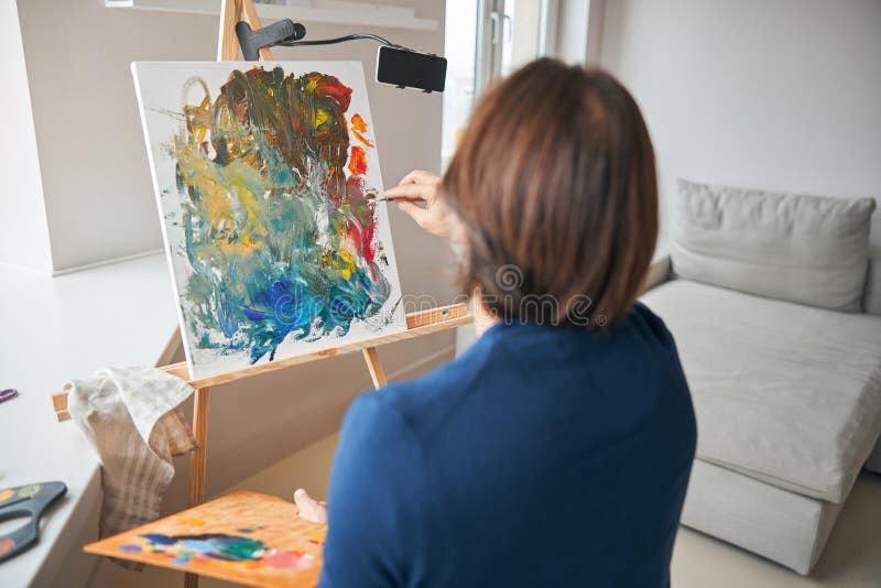 Back-view Photo of Focused Artist Creating a Painting Stock Photo ...
