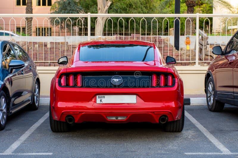 Rear View of Red Ford Mustang in the Parking in Dubai City. Editorial