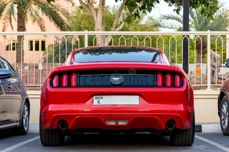 Rear View of Red Ford Mustang in the Parking in Dubai City. Editorial
