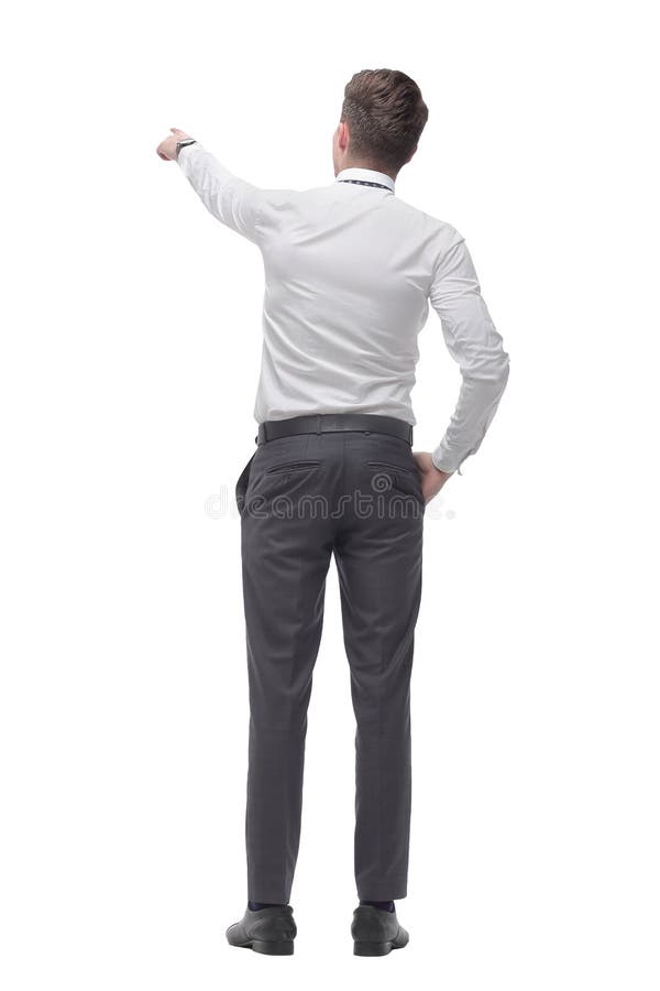 Rear view.smiling young businessman pointing at white screen