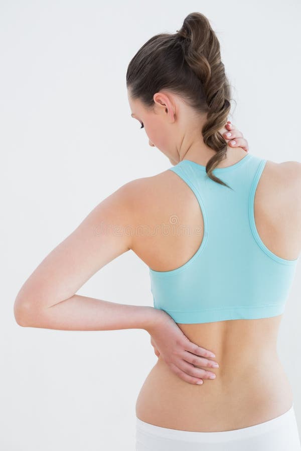 Mid Section of Toned Woman from Back Pain on Beach Stock Photo - Image of  standing, athletic: 37050404