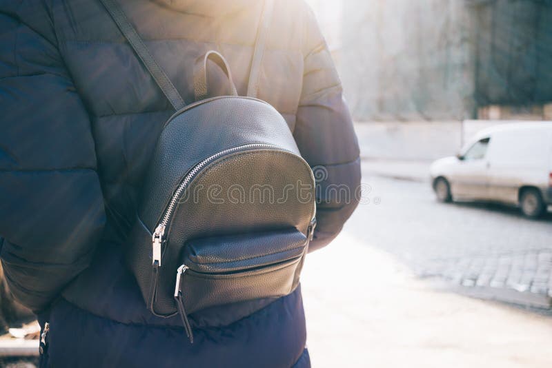 Rear view woman with leather backpack stock image Rear view woman with leather backpack stock image