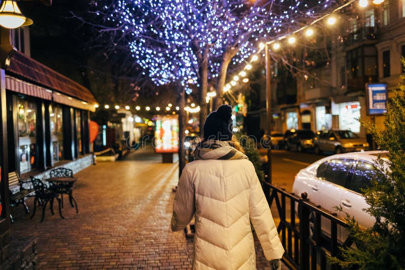 Rear view of young woman in warm clothes royalty free stock photography Rear view of young woman in warm clothes royalty free stock photography