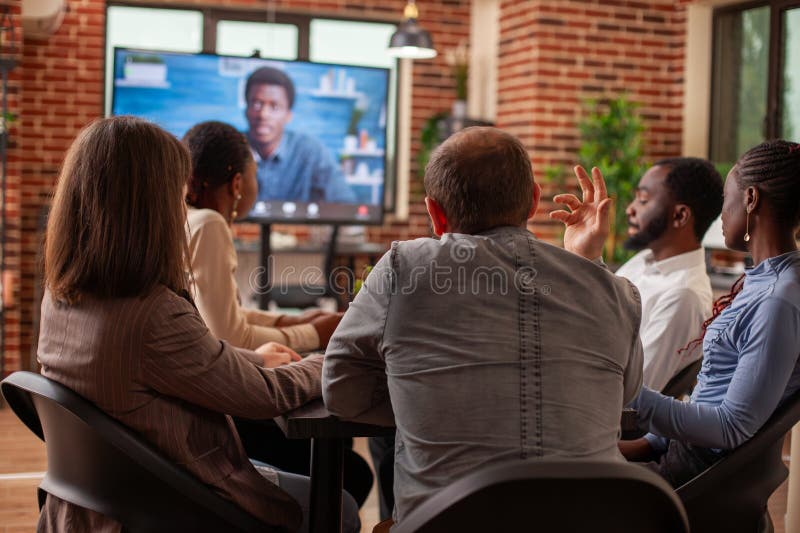 Rearview brainstorming session in office stock photos