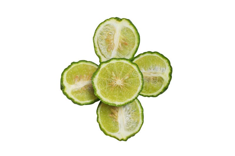 Rebanadas de cal del cafre de la bergamota en forma de la flor aislada en el fondo blanco foto de archivo libre de regalías Rebanadas de cal del cafre de la bergamota en forma de la flor aislada en el fondo blanco foto de archivo libre de regalías