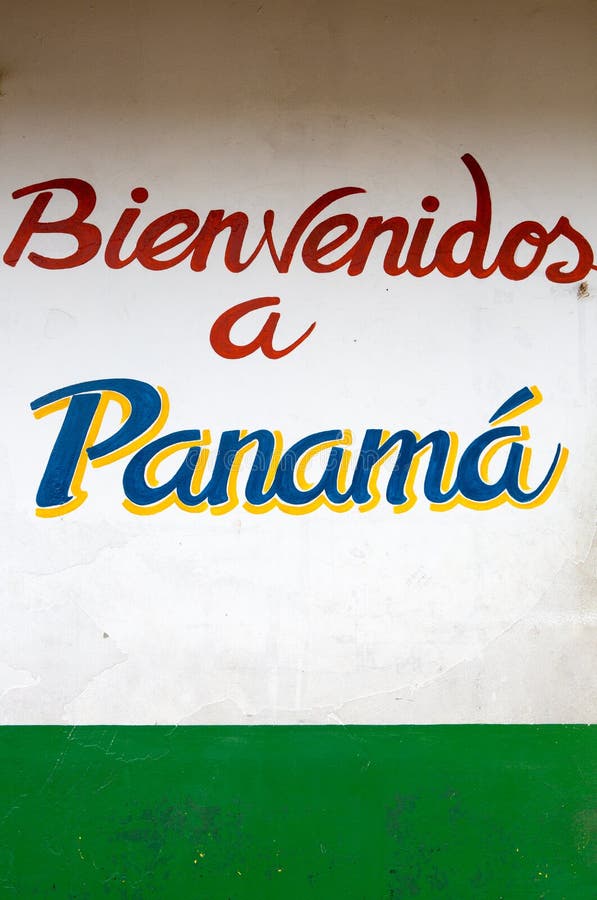 Sign welcome in Panama painted on a white and green wall at Sixaola border with vintage style. 2014. Sign welcome in Panama painted on a white and green wall at Sixaola border with vintage style. 2014