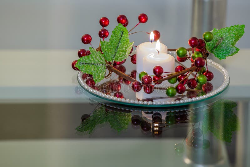 Reception Interior with Candles and Flowers on a Mirror Plate Stock