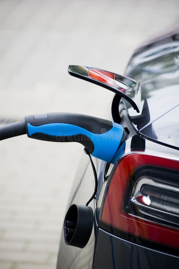 Recharging Electric Car by Power Cable. Stock Image Image of station