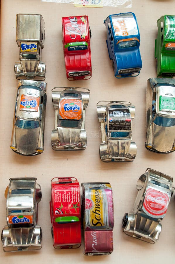 Recycled toy cars mad of old tin and soda cans. For sale in Noumea New Caledonia. Recycled toy cars mad of old tin and soda cans. For sale in Noumea New Caledonia