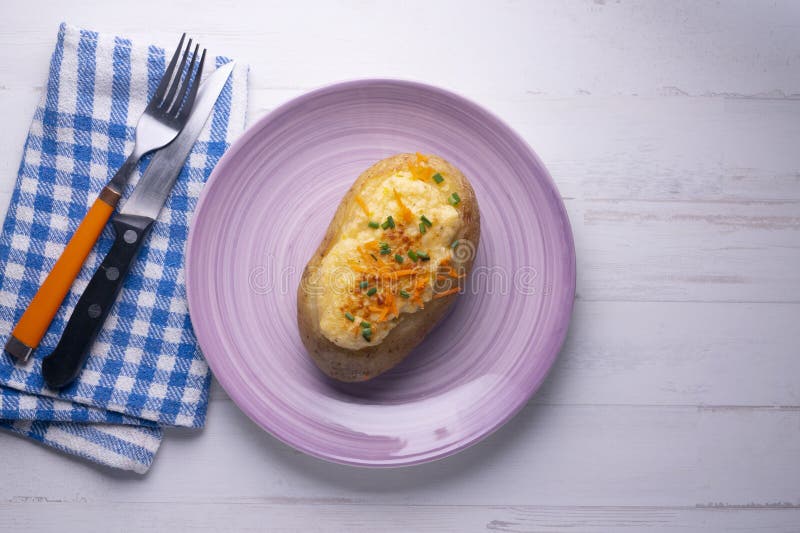 Baked Potato Souffle with Gratin Cheese. Stock Photo Image of table