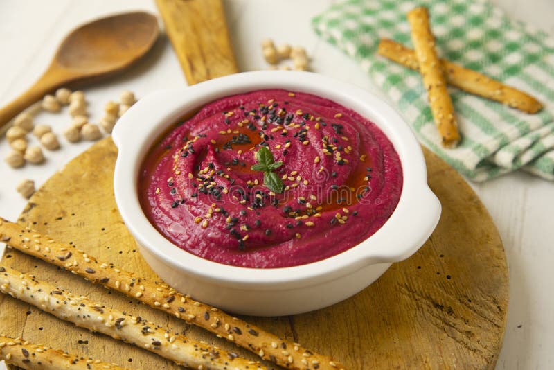 Beetroot Hummus is a Cream of Chickpeas Cooked with Lemon Juice, Which